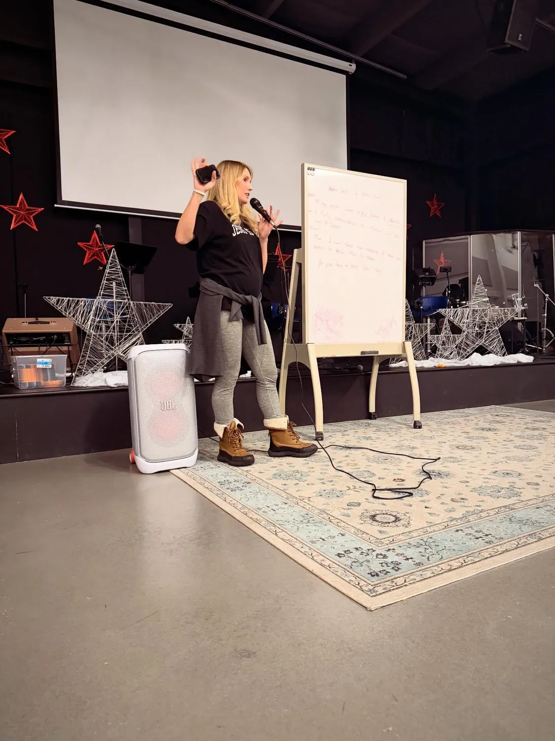 Teaching at a whiteboard during an evangelism training session